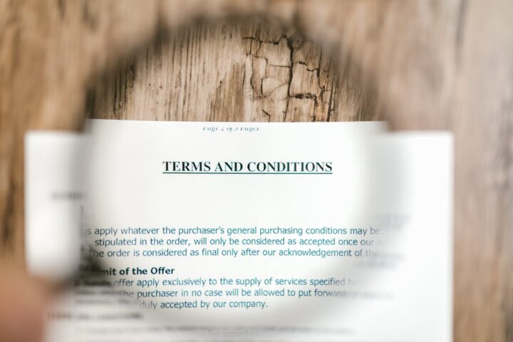 selective focus photo of terms and conditions written on a paper